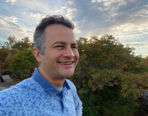 Felipe Jain, M.D. looking out over landscape