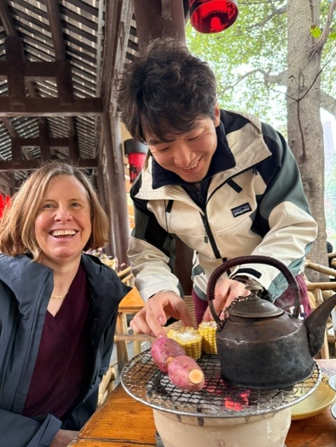 Jo Mattoon and Yifeng enjoying tea in China. Hoffman podcast