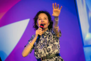 Sonia Choquette Hoffman Podcast Speaking on stage at MindValley Paris